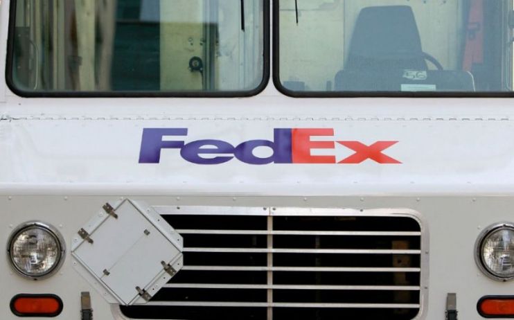 Shares of global delivery giant FedEx&nbsp;sank before the bell on Wednesday after its dismal results and outlook prompted a slew of price-target cuts from Wall Street, which said its air delivery business needed improvements.