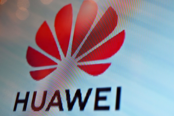A Huawei logo is seen on a screen during the Mobile World Congress (MWC 2019) introducing next-generation technology at the Shanghai New International Expo Centre (SNIEC) in Shanghai on June 26, 2019. (Photo by Hector RETAMAL / AFP) (Photo credit should read HECTOR RETAMAL/AFP/Getty Images)