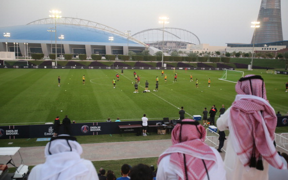 A general view shows Qataris watching Paris Saint-Germain football team training at the Aspire Academy of Sports Excellence in the Qatari capital Doha on December 31, 2012. PSG is in Qatar for a week-long training camp before the resumption of the French Ligue 1 after the winter break. AFP PHOTO / AL-WATAN DOHA / KARIM JAAFAR == QATAR OUT == (Photo credit should read KARIM JAAFAR/AFP/Getty Images)