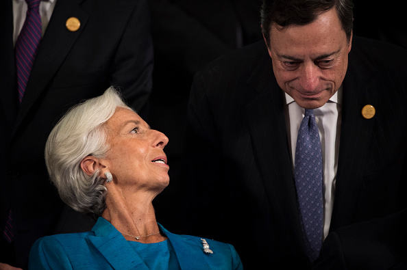 IMF head Christine Lagarde talks to ECB president Mario Draghi