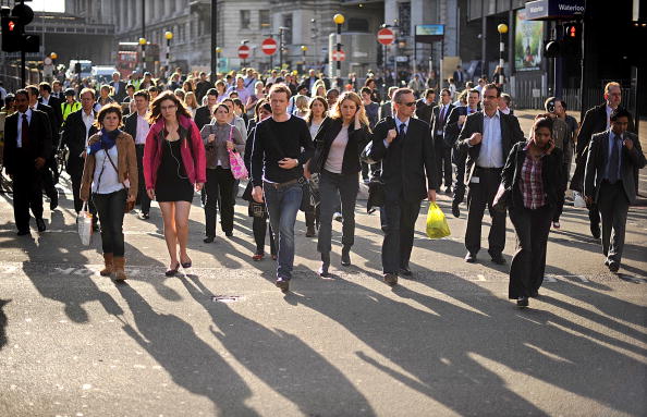 Commuters walk from Waterloo Station in central London, on September 7, 2010, as workers on London's Underground train system started a 24-hour strike over staffing cuts. Thousands of workers walked out during the evening rush hour at 5:00 pm (1600 GMT) Monday, in protest at plans to axe 800 jobs in a cost-cutting measure. AFP PHOTO/BEN STANSALL (Photo credit should read BEN STANSALL/AFP/Getty Images)