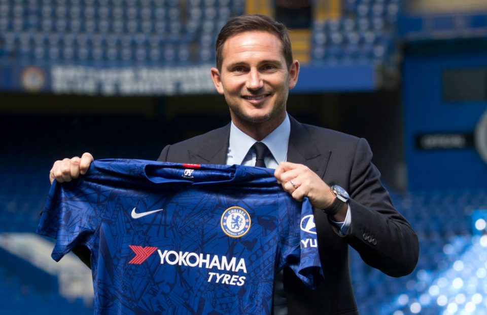 Chelsea's newly appointed English head coach Frank Lampard poses for the press at Stamford Bridge in London on July 4, 2019. - Frank Lampard was appointed Chelsea head coach today, confirming a dramatic return for one of the club's greatest ever players. Lampard has signed a three-year contract with the Premier League club, where he spent 13 years and became the team's all-time leading scorer with 211 goals. (Photo by Isabel Infantes / AFP) (Photo credit should read ISABEL INFANTES/AFP/Getty Images)