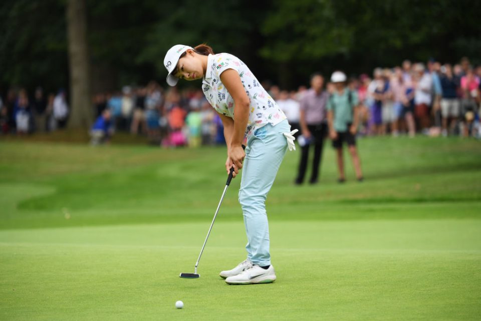 WOBURN, ENGLAND - AUGUST 04: Hinako Shibuno of Japan holes the winning putt on the 18th green during Day Four of the AIG Women's British Open at Woburn Golf Club on August 04, 2019 in Woburn, England. (Photo by Ross Kinnaird/Getty Images)