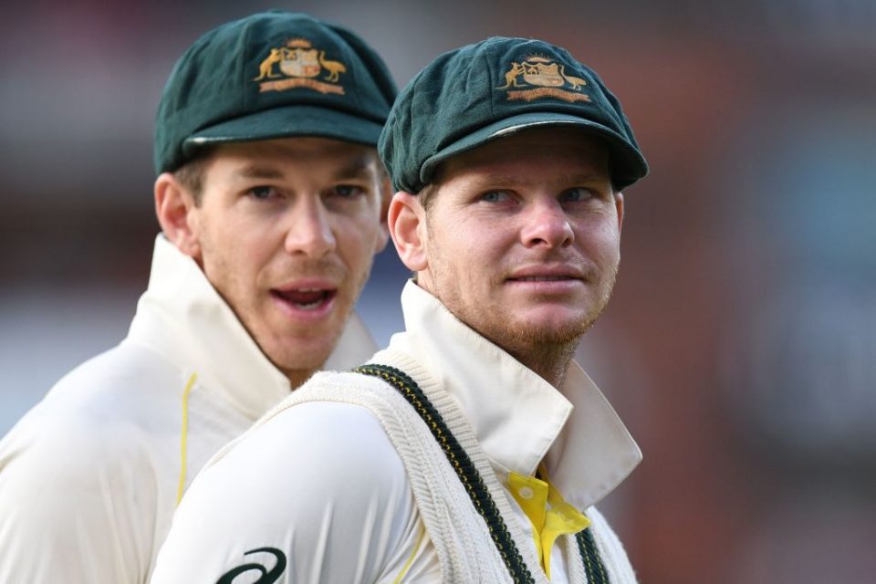 Australia's captain Tim Paine (L) and Australia's Steve Smith (R) celebrate their victory on the field after the fourth Ashes cricket Test match between England and Australia at Old Trafford in Manchester, north-west England on September 8, 2019. - Australia retained the Ashes with a 185-run thrashing of England in the fourth Test at Old Trafford on Sunday. (Photo by Oli SCARFF / AFP) / RESTRICTED TO EDITORIAL USE. NO ASSOCIATION WITH DIRECT COMPETITOR OF SPONSOR, PARTNER, OR SUPPLIER OF THE ECB (Photo credit should read OLI SCARFF/AFP/Getty Images)