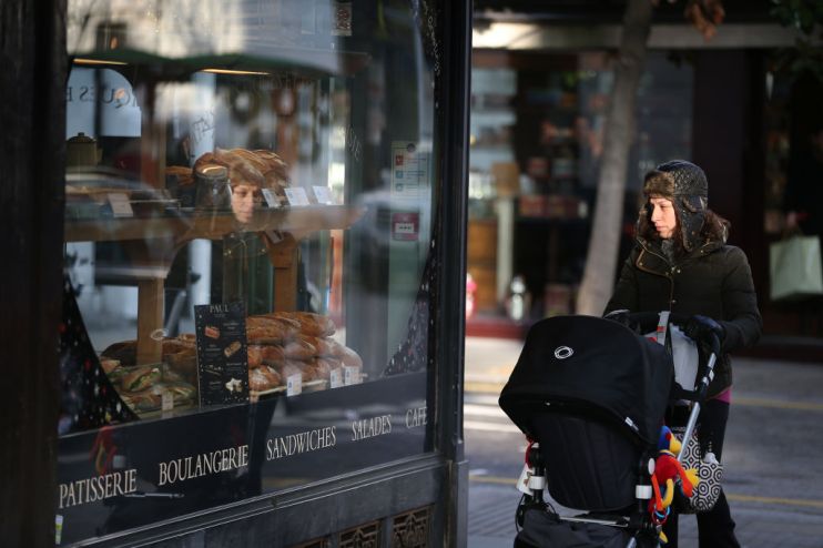 UK services firms and consumers grow cheerier despite coronavirus