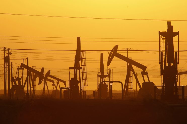 US crude oil inventories neared record levels today as producers continued to pump despite a near-total collapse in demand.