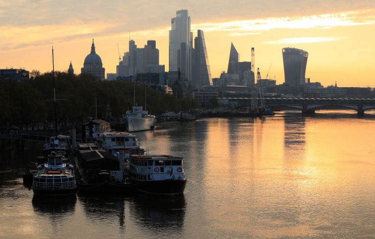 FTSE 100 opens flat as investors weigh earnings and coronavirus cases