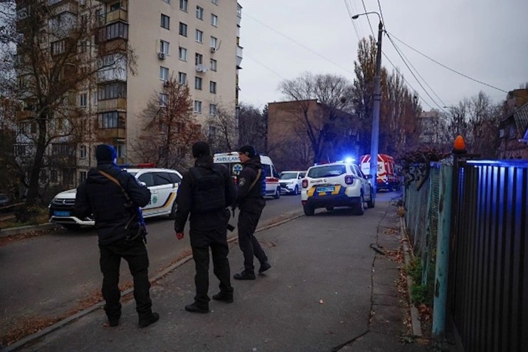 Rescue workers at the scene of a missile strike in the Pechers district on November 15, 2022 in Kyiv, Ukraine. (Photo by Jeff J Mitchell/Getty Images)