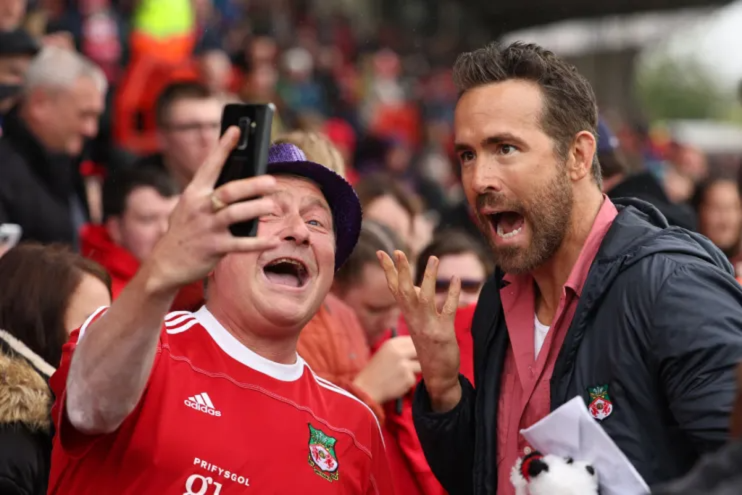 Disney+ launched in the UK in March 2020, and has streamed the popular fly-on-the-wall doc &lsquo;Welcome to Wrexham.&rsquo; Here, Ryan Reynolds the co-owner of Wrexham greets the fans prior to Wrexham&rsquo;s first game back in the football league prior to the Sky Bet League Two match between Wrexham and Milton Keynes Dons at Racecourse Ground on August 5, 2023 in Wrexham, Wales. (Photo by Matthew Ashton &ndash; AMA/Getty Images)