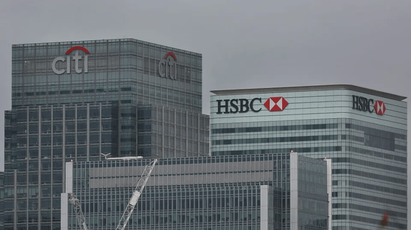FTSE 100 lenders were in the red as markers opened.