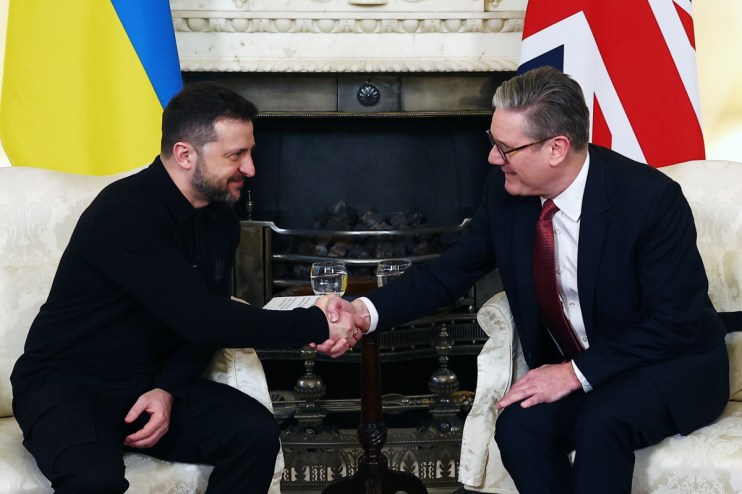 Labour has overtaken the Conservatives as the party most trusted to manage the UK&rsquo;s defence and national security, a new poll has found. Pictured, Keir Starmer (right) with Volodymyr Zelenskyy. Photo: PA
