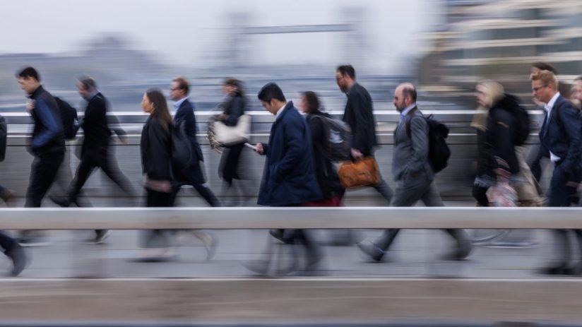 New employment rights concept with diverse workers discussing whistleblowing and sick pay regulations in an office setting