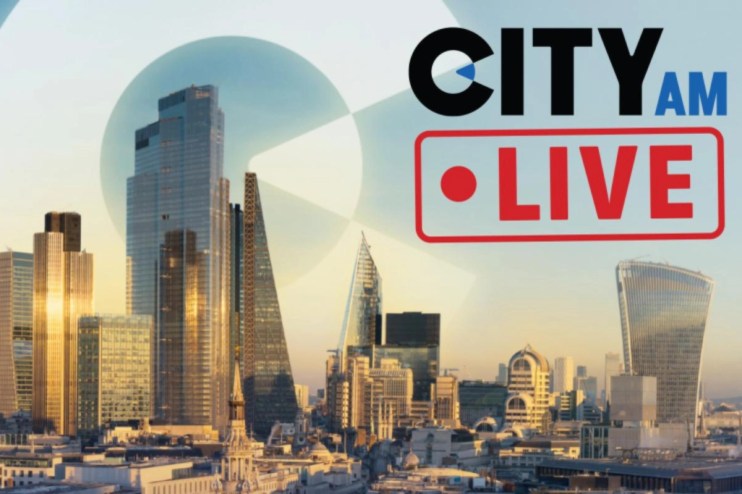 City PM live blog updates on latest news and business events in an urban setting with bustling streets and skyscrapers