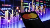 Mastercard logo prominently displayed on a sleek office building, symbolizing global financial services and innovation.