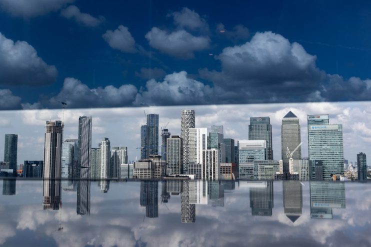 Skyline of Canada financial district with modern skyscrapers and historic landmarks under a clear blue sky