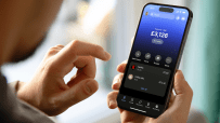 Revolut app interface showcasing new features and design on a smartphone screen in a UK business environment.