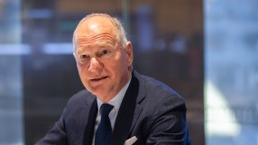 Heathrow CEO Thomas Woldbye in a suit and tie, speaking at an event, warning against a tax raid.
