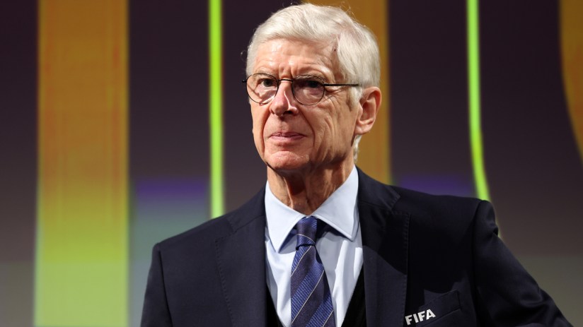 Ars&egrave;ne Wenger, FIFAs Chief of Global Football Development, in a suit and tie, looking serious.
